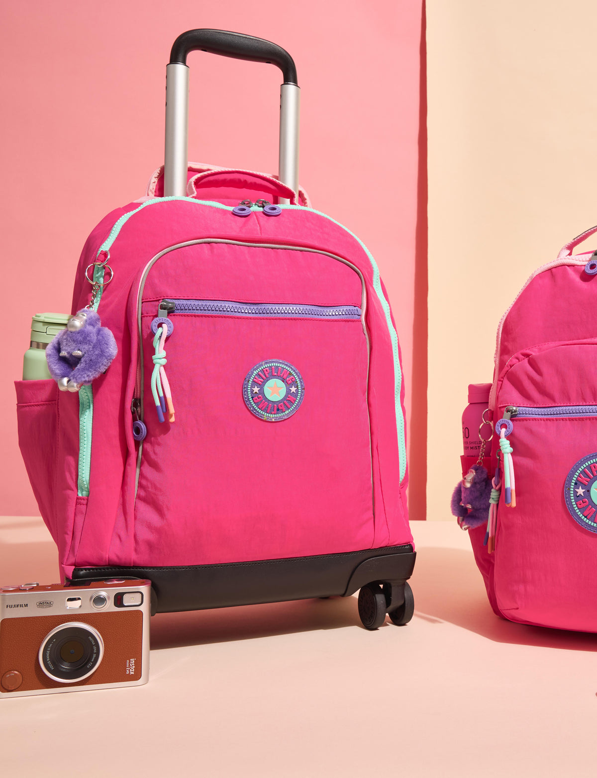 best kipling backpack for travel Seoul Large Metallic 15" Laptop Silver Glow Metallic Features include front vertial zip pcoket Everything you need to know