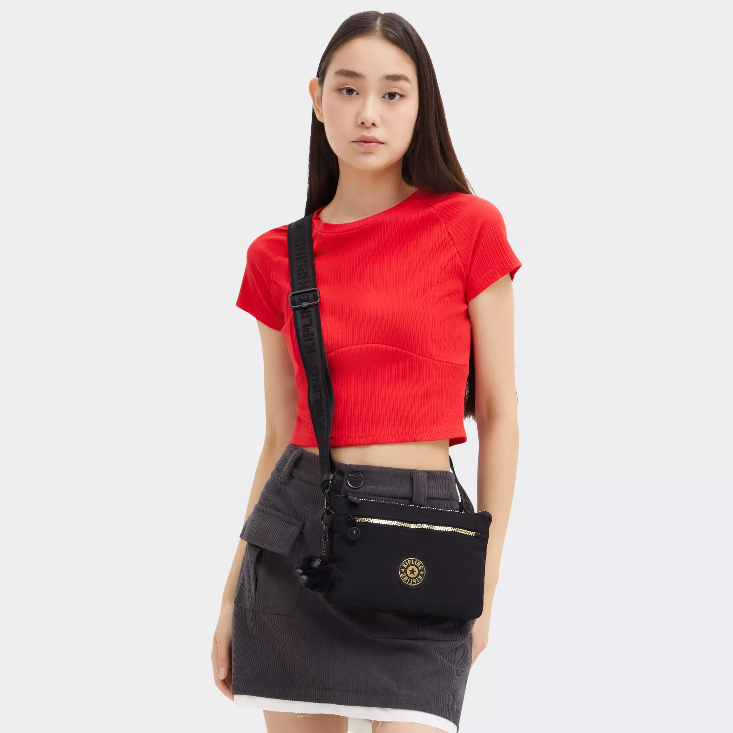 Riri Zip Crossbody Bag